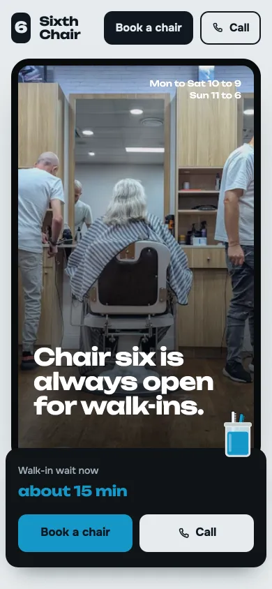 Sixth Chair Barbers on a phone