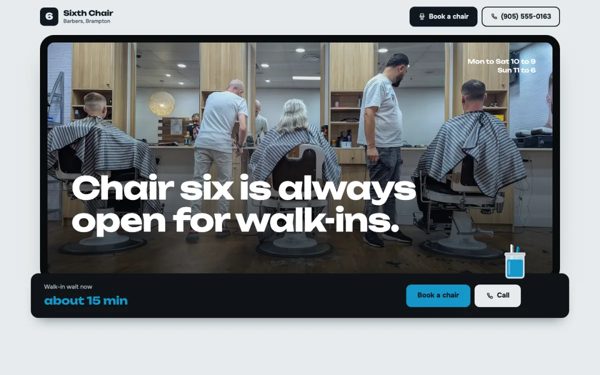 Sixth Chair Barbers website: the shop seen in a barber's mirror with a walk-in wait time